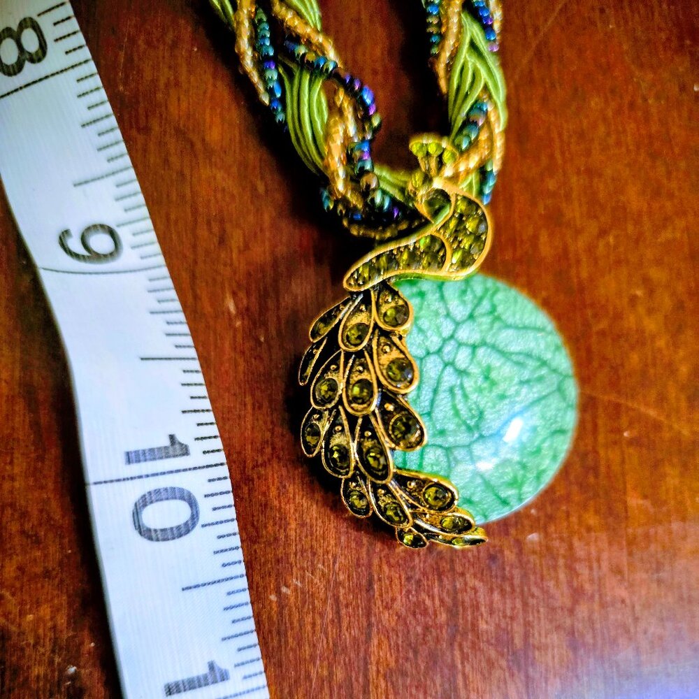 Lucky peacock on this lovely green and blue seed bead necklace.